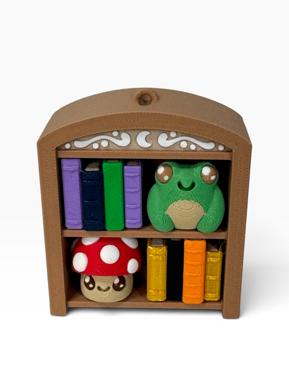Enchanted Bookshelf Clicker with Frog and Mushroom