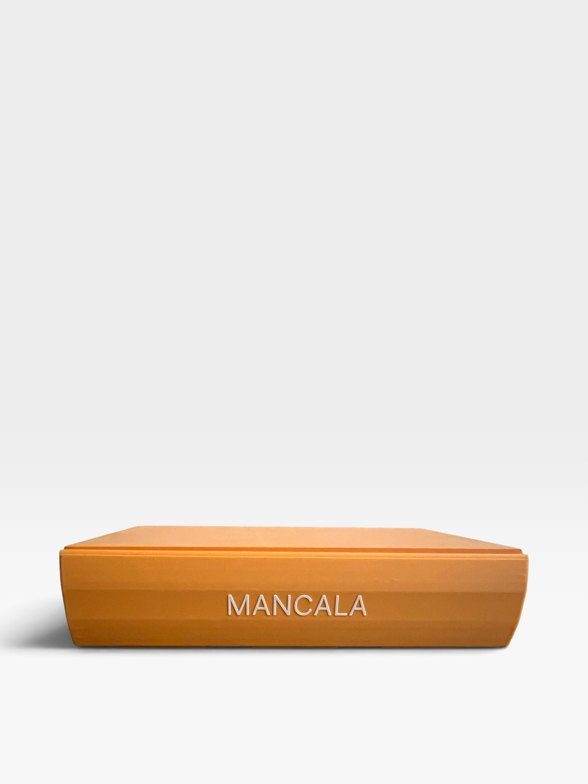Mancala book-shaped board game closed