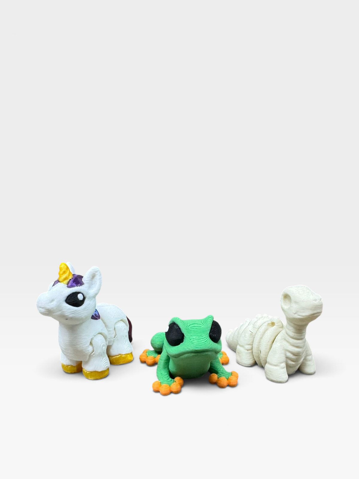 Example unicorn, frog and dinosaur Pocket Pals